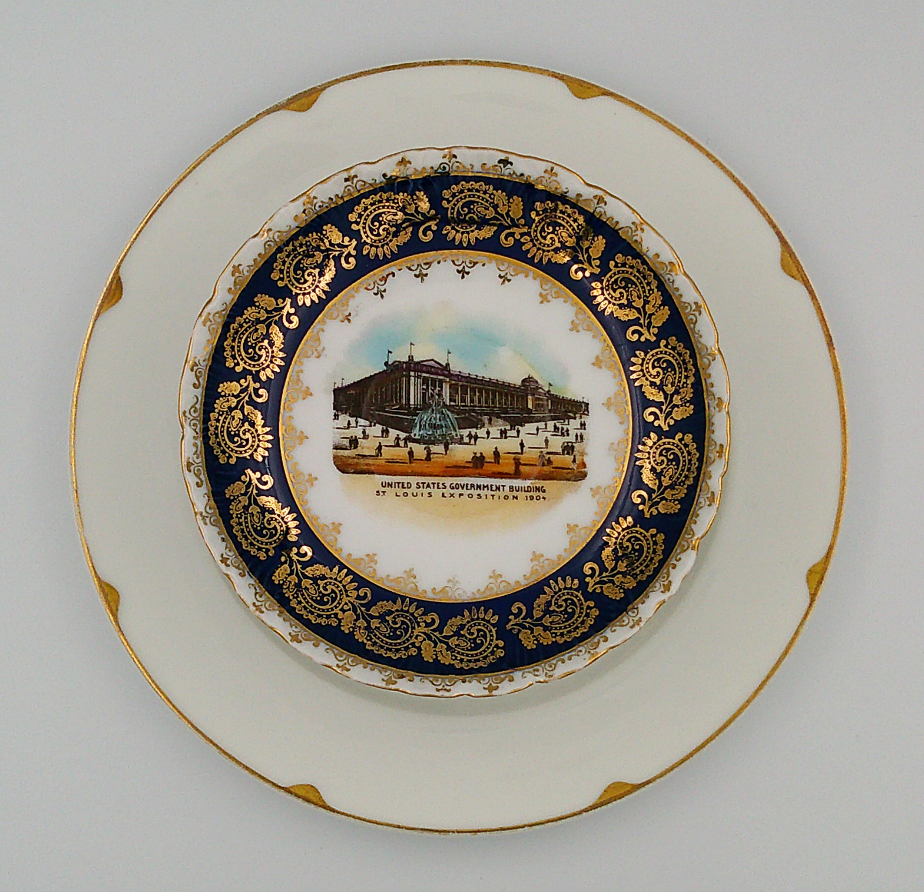 This view is from the top straight down showing the government building at the St. Louis Expo. The saucer is 5.5"W, plate 9"W and  dish 4"H. This view is from the top straight down showing the government building at the St. Louis Expo. The saucer is 5.5"W, plate 9"W and  dish 4"H.